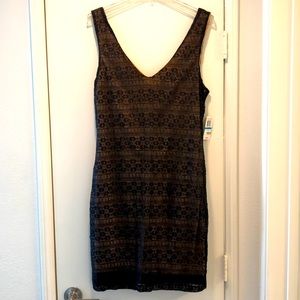 Brand new body-con dress. Black lace over nude lining - size XL